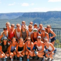 The team standing in front of the Blue Mountains